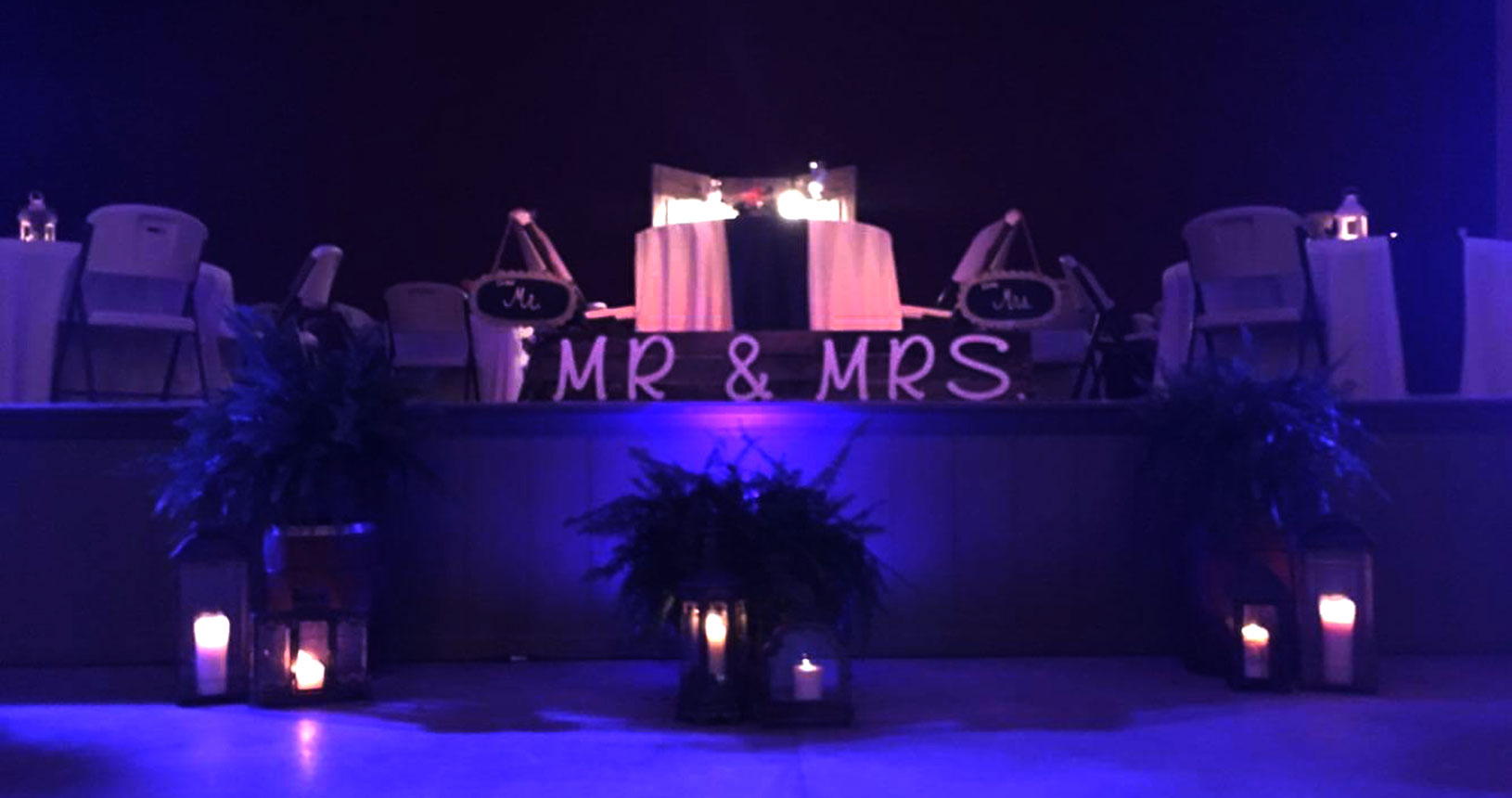 A lighted sign that says mr and mrs.